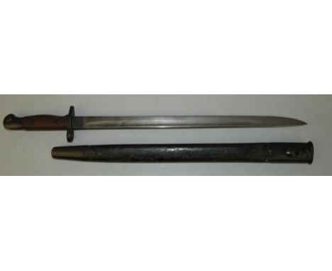 A 1907 pattern Lee Enfield bayonet marked '11 and '23, 43cm blade in a blackened leather steel tipped scabbard, overall lengt