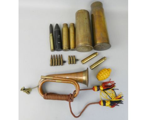A military brass and copper bugle, unmarked with regimental lanyard, together with a dummy Mills grenade and a quantity of sh