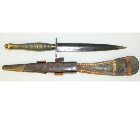 A Fairburn Sykes commando knife, 2nd pattern, marked with broad arrow above number 2, as carried by airborne forces, double e