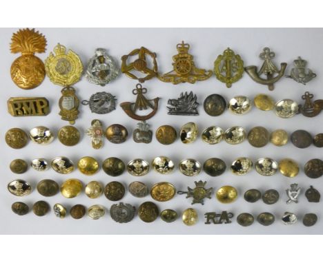 A quantity of mostly British army buttons and badges including, Green Howards, military police, Royal artillery, Royal engine