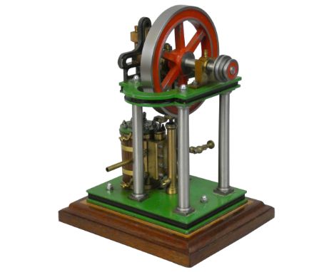 A scratchbuilt "Poly Engineering" air driven single wood clad cylinder steel and brass model cross engine, on wooden plinth, 