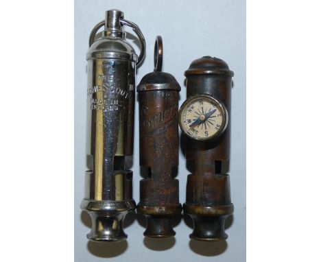 Three scout whistles, the Acme Scout in chrome, the brass Emca Boy scout and the Emca Boy scout with attached compass (missin