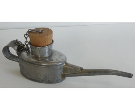 A small railway engine drivers’ oil can (ex stores), with oak stopper on metal chain, height 8.5cm.