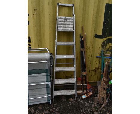 THREE BUNDLES OF GARDEN HAND TOOLS, including shovels, spades, axes, mallets, brushes, rakes, etc, along with an aluminium st