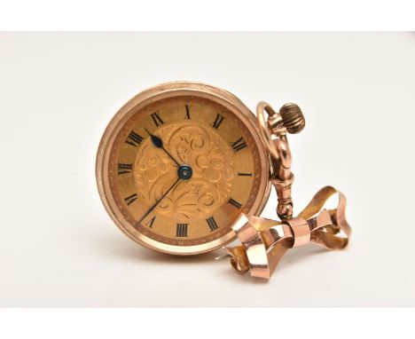 A 9CT GOLD LADIES FOB POCKET WATCH WITH BROOCH CLIP, manual wind, round gold floral detailed dial, Roman numerals, blue steel