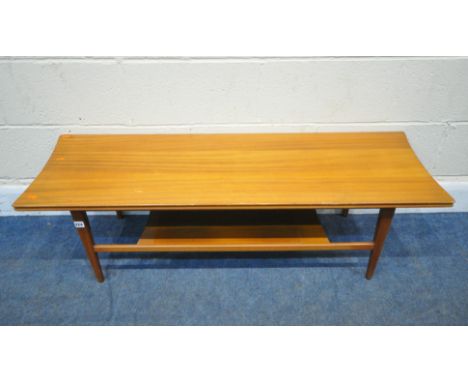 POSSIBLY RICHARD HORNBY, A MID-CENTURY TEAK COFFEE TABLE, with concave ends, raised on square tapered legs, united by an unde