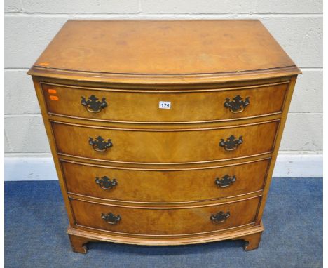 A REPRODUCTION GEORGIAN STYLE BOW FRONT CHEST OF FOUR DRAWERS, raised on bracket feet, width 78cm x depth 53cm x height 85cm,