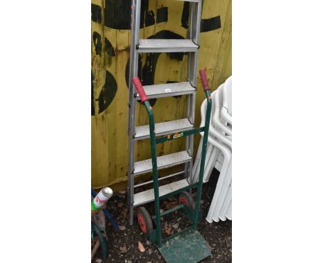 AN ALUMINIUM FOLDING STEP LADDER AND A CHILLINGTON GREEN SACK TRUCK (2)