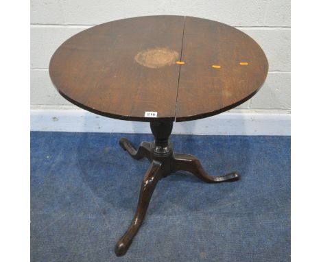 A GEORGIAN OAK CIRCULAR TILT TOP TRIPOD TABLE, raised on a turned support, with three cabriole legs, diameter 77cm x height 6