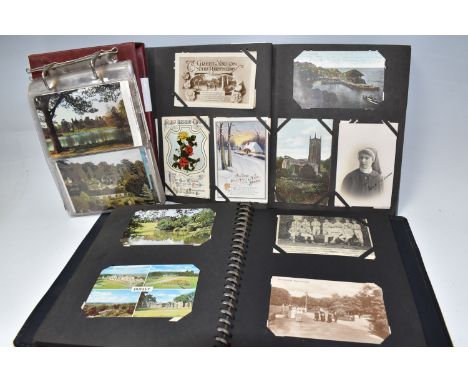 THREE POSTCARD ALBUMS comprising an album of approximately eighty postcards centred on Alton Towers, Stafford, and the surrou