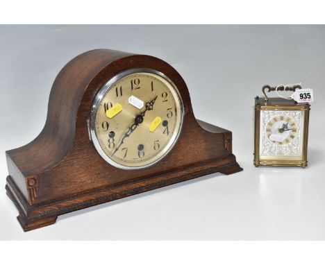 A WOODEN ENFIELD MANTEL CLOCK AND A CARRIAGE CLOCK comprising a Smiths carriage clock with a dedication plaque to the top (ap