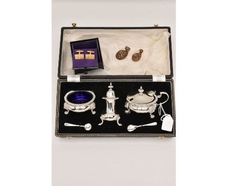 A CASED SILVER CONDIMENT SET, to include a salt, mustard, pepperette and two spoons, hallmarked 'Adie Brothers Ltd' Birmingha