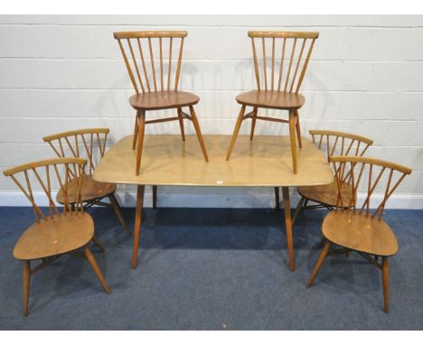 LUCIAN ERCOLANI, AN ERCOL MID-CENTURY ELM AND BEECH RECTANGULAR DINING TABLE, raised on square tapered legs, model 382, lengt
