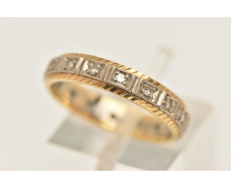 A BI COLOUR ETERNITY BAND RING, white and yellow metal ring set with sixteen single cut diamonds, approximate band width 4mm,