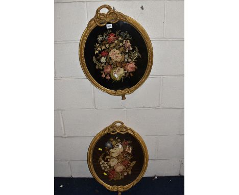 TWO 19TH CENTURY NEEDLEWORK PICTURES, comprising floral still life pictures composed of woollen stitches on a black and brown