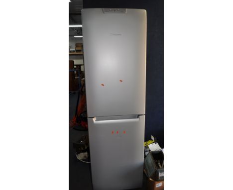 A HOTPOINT FF200E FRIDGE FREEZER width 60cm, depth 63cm, height 200cm (PAT pass and working at 3 and -20 degrees)