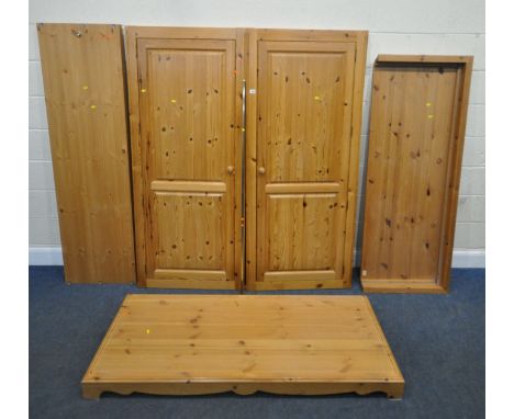 A MODERN PINE DOUBLE DOOR WARDROBE, width 162cm x depth 60cm x height 197cm, condition report: dismantled, small envelope wit