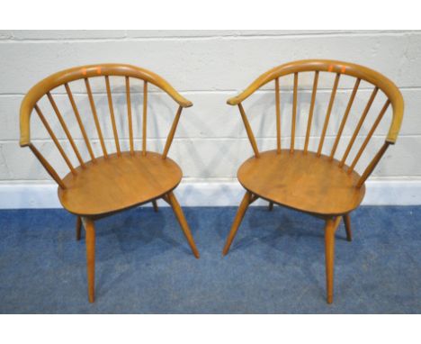 LUCIAN ERCOLANI, A PAIR OF ERCOL MID-CENTURY ELM AND BEECH COW HORN ARMCHAIRS, model number 449A, with a shaped backrest, spi
