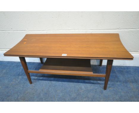 POSSIBLY RICHARD HORNBY, A MID-CENTURY TEAK COFFEE TABLE, with concave ends, raised on square tapered legs, united by an unde