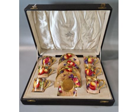 Twelve piece Royal Worcester porcelain set of six coffee cans and six saucers, hand-painted with various fruits including app