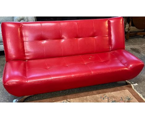 Mid century red leather look Italian designer sofa bed on chrome supports.  (B.P. 21% + VAT) 