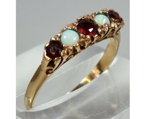 9ct gold opal and ruby stone five stone dress ring. 1.8g approx. Size L1/2. (B.P. 21% + VAT) 