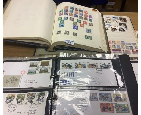 All world collection of stamps in large stockbook, Durham album and two albums of GB First Day Covers. (B.P. 21% + VAT) 