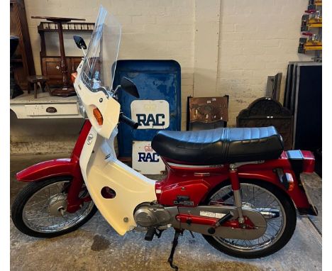 MOTORCYCLE to be sold at 12 Noon precisely.1997 Honda C90 Cub 'Step through' motorcycle, Reg No R281 TAU in really good, near