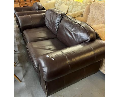 Thomas Lloyd, a modern leather three piece suite comprising large two seater sofa, armchair and stool. (3) (B.P. 21% + VAT) 