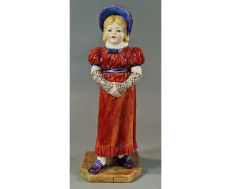 Royal Worcester porcelain Kate Greenaway figurine, girl in bonnet with fingerless gloves. Puce printed marks to the underside