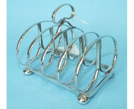 A silver four-division toast rack, maker Haseler & Bill, Chester 1923, ___4½oz.