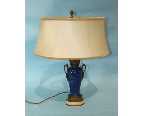 An early-20th century baluster shape ceramic and gilt-metal-mounted table lamp, on alabaster plinth, 53cm high.