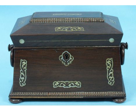 A small Regency rosewood and mother-of-pearl-inlaid two-division tea caddy, with wood ring handles and ¼ bead decoration, on 