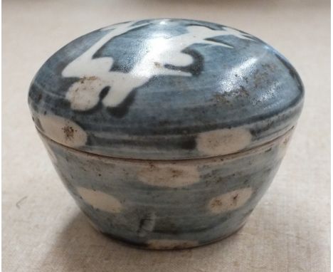 A St Ives Leach Pottery circular covered box decorated in blue with a prunus spray, impressed marks to base.