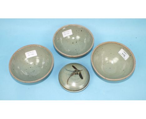 A David Leach earthenware covered circular 'fern' box with a celadon glaze and three David Leach celadon-glazed bowls, artist