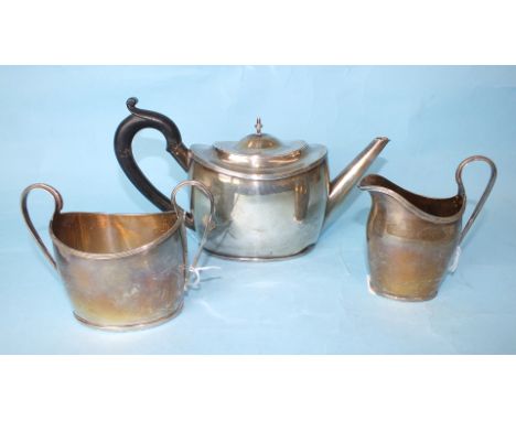 A three-piece silver tea service of oval form, Chester 1922, total weight ___22oz.