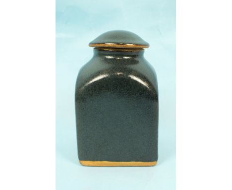 A Bernard Leach St Ives Pottery earthenware tea jar and domed cover, in a dark Tenmoku glaze, impressed artists monogram and 