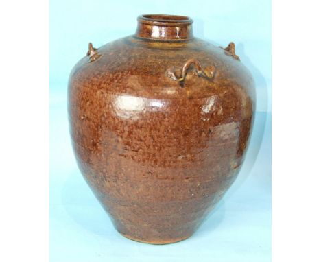 A large earthenware water pitcher covered in a dark brown glaze and with four loop handles to the shoulders, impressed St Ive