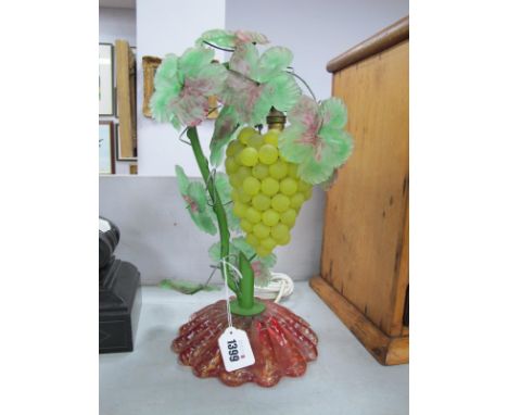 A Vintage Czech Murano Style Glass Table Lamp, modelled with a bunch of grapes amongst vine leaves on a fluted red circular b