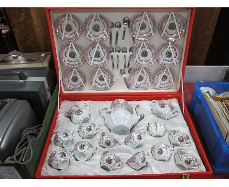 A Eastern Cased Tea Service, comprising tea pot, cream sugar, twelve cups and saucers, and teaspoons, in a decorative red fit
