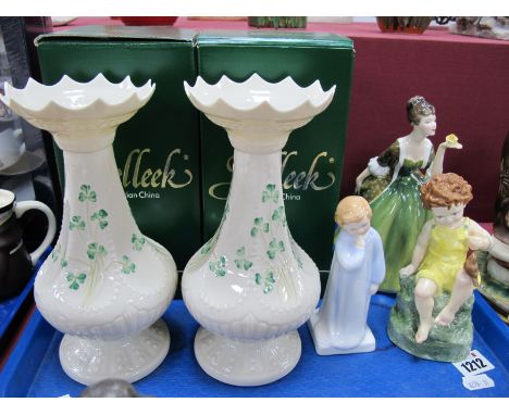 A Pair of Modern Belleek Vases, decorated wth Shamrock, brown backstamps (both boxed). Royal Worcester 'Fridays Child' figuri