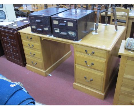 Andrew Jordan, Cumbria, light oak pedestal desk, top with a moulded edge, one pedestal with four drawers, one pedestal with t
