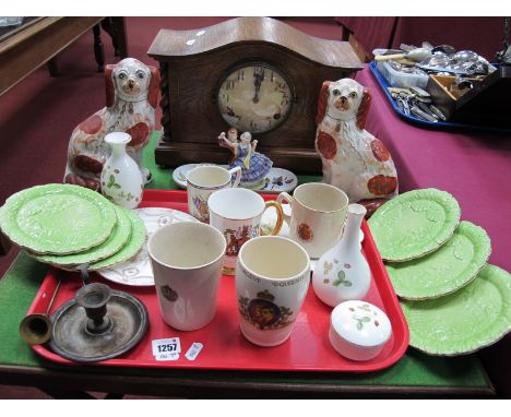 An Oak Cased Mantle Clock, Arabic numeral dial, barley twist supports, with a pair of Staffordshire type dogs, commemorative'