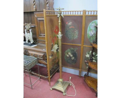 XX Century Brass Standard Lamp, in the form of a corinthian column, on a stepped base, paw feet.