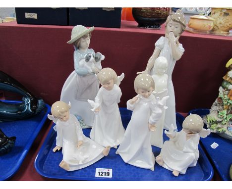 Nao Figure of Girl Holding Puppies, another in nightdress, Leonardo collection angelic, cherubs, etc:- One Tray.