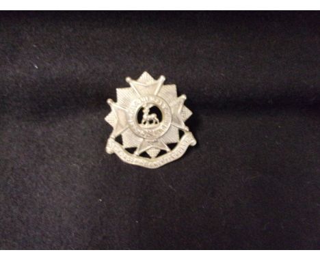 The Bedfordshire &amp; Hertfordshire Regiment (White-metal), two lugs. K&amp;K: 611