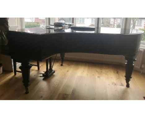 Bechstein (c1911)   A 6ft 7in grand piano in a bright ebonised case on turned octagonal legs; together with a stool with a bu