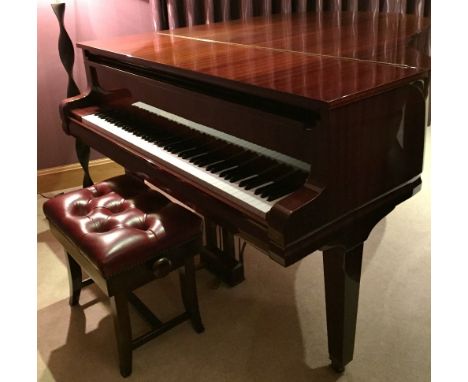 August Forster (c1990) A Model 170 grand piano in a mahogany case on square tapered legs; together with a stool with dark red