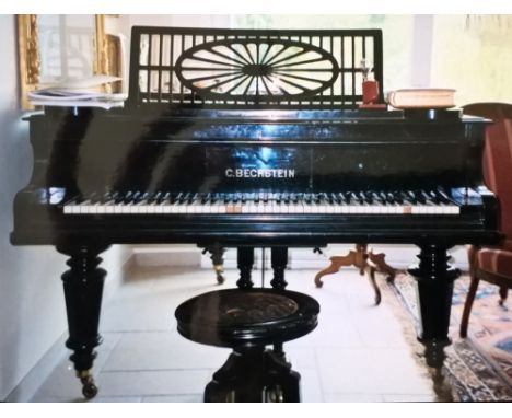 Bechstein (c1909)A 6ft Model A grand piano in an ebonised case on turned octagonal legs.