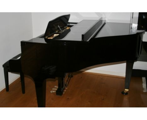 Kawai (c2015) A 5ft Model GM10 grand piano in a bright ebonised case on square tapered legs.